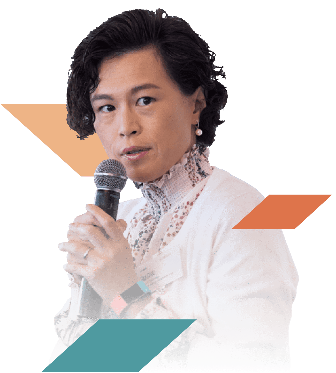 A speaker addressing an OutQUORUM summit, framed by teal and coral shapes